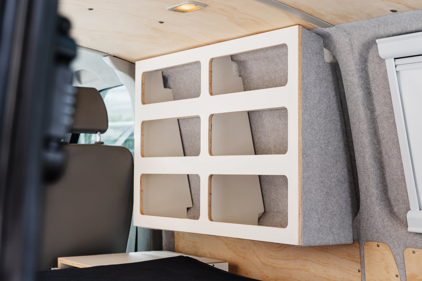 Luffare Hanging Shelve installed in van, viewed from the rear showing position high on the side wall.